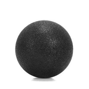 Black massage ball on a white background